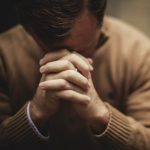man praying